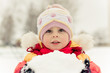 Beautiful baby in a red jacket