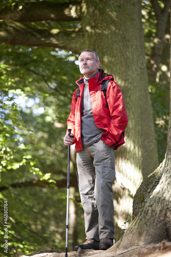 Photo: A mature man standing in the countryside A mature man standing in the countryside
