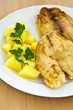 Fried fish with boiled potatoes