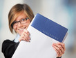 young lady with documents for application