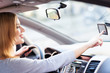 Young woman using GPS