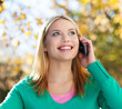 Woman using mobile phone outdoors