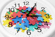 Clock and Puzzle Pieces