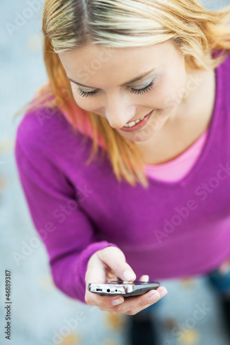Photo: Woman writing sms Woman writing sms