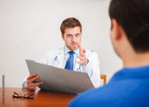 Photo: Doctor talking to a patient Doctor talking to a patient