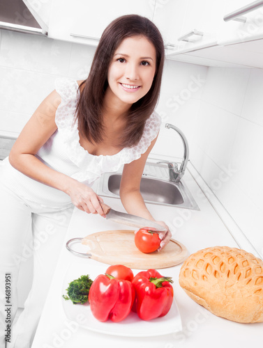 Photo: woman making salad woman making salad
