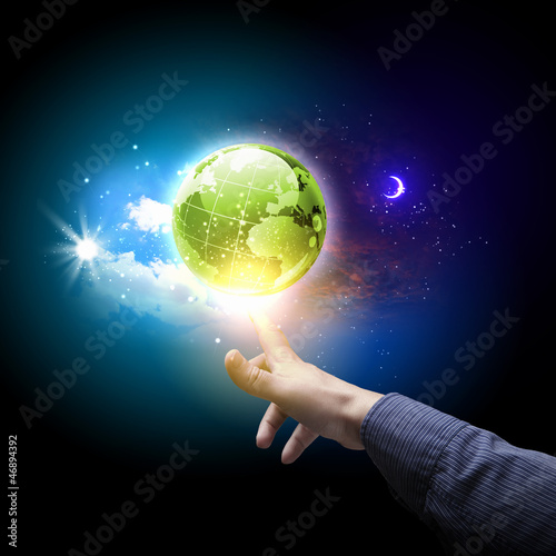 Photo: hand touching the earth hand touching the earth