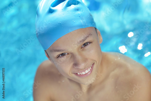 Photo: happy child on swimming pool happy child on swimming pool