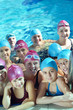 happy children group  at swimming pool