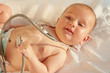 Foto: Baby playing with a stethoscope Baby playing with a stethoscope