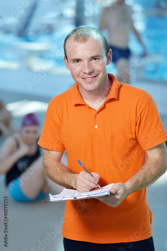 Photo: happy children group at swimming pool happy children group at swimming pool