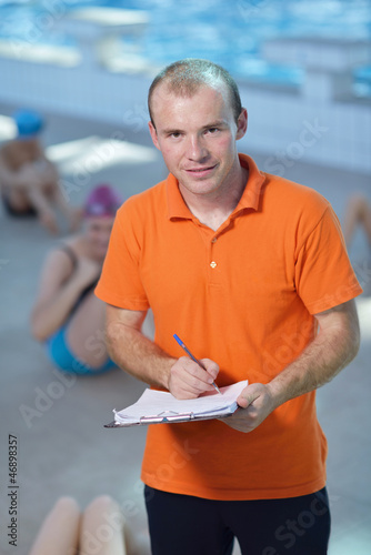 Photo: happy children group at swimming pool happy children group at swimming pool