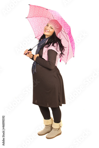 Photo: Happy pregnant woman with umbrella Happy pregnant woman with umbrella