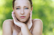 young woman with bared shoulders