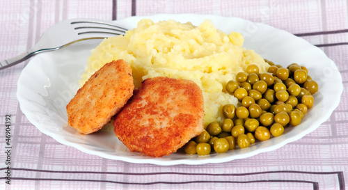 Photo: Meat cutlet with potato garnish Meat cutlet with potato garnish