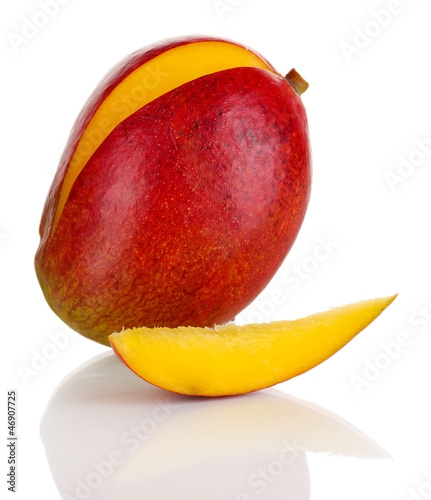 Photo: Ripe appetizing mango isolated on white Ripe appetizing mango isolated on white