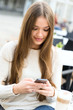 Text messaging. Looking down