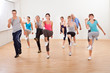 Group of people doing aerobics exercises