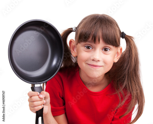 Photo: Little girl holding a frying pan Little girl holding a frying pan