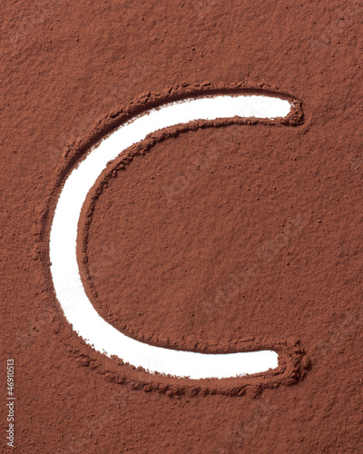 Photo: Letter C made of cocoa powder Letter C made of cocoa powder