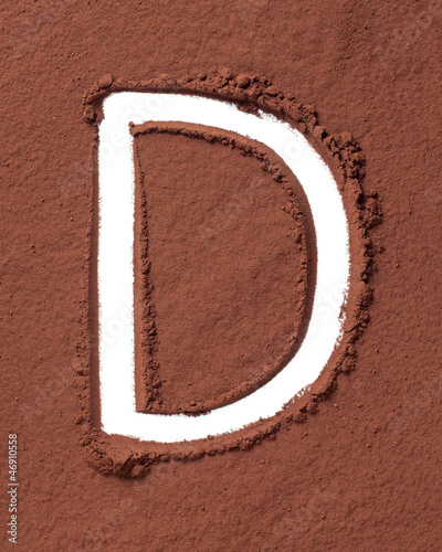 Photo: Letter D made of cocoa powder Letter D made of cocoa powder