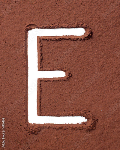 Photo: Letter E made of cocoa powder Letter E made of cocoa powder
