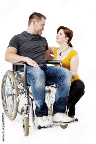 Photo: Man in wheelchair and his girlfriend is worried Man in wheelchair and his girlfriend is worried