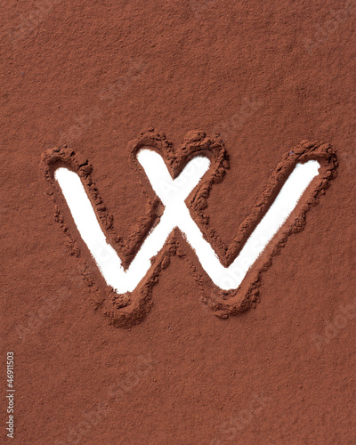 Photo: Letter W made of cocoa powder Letter W made of cocoa powder