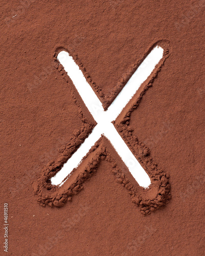 Photo: Letter X made of cocoa powder Letter X made of cocoa powder