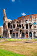 Colosseum in Beautiful Summer Day with Blue Sky (vertical shot)