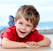 three years old boy having fun