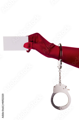 Photo: Woman holding business card Woman holding business card