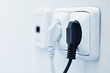 electric plug in a socket