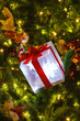 Decorated gift box on the Christmas tree