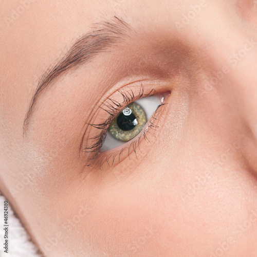 Photo: Part of woman face: closeup eye Part of woman face: closeup eye