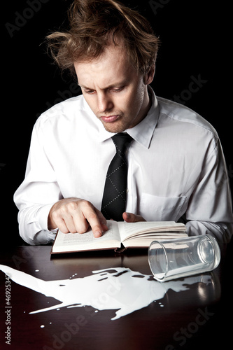 Photo: Businessman with help manual business challenge concept Businessman with help manual business challenge concept