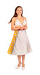 Beautiful woman dressed in bikini and skirt smiles in studio