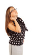 Business woman in glasses looks up in studio on white background