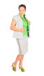 Young beautiful business woman poses in studio on white