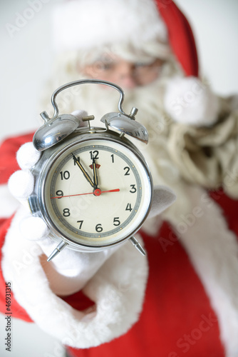 Photo: Weihnachtsmann mit Wecker Weihnachtsmann mit Wecker