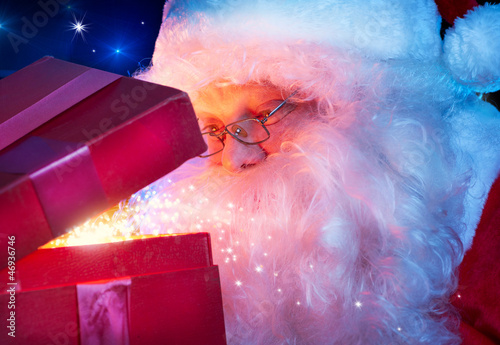Photo: Santa Claus with Magic Christmas Gift Santa Claus with Magic Christmas Gift