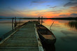 Steg, Boot und Sonnenuntergang