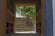 Luentshe Dzong, entrance gate with prayer wheels - Bhutan