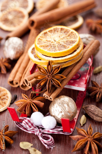 Photo: Christmas spices: star anise, cinnamon, cardamom and oranges Christmas spices: star anise, cinnamon, cardamom and oranges