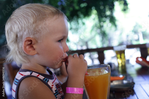 Photo: Boy drinking fresh juice Boy drinking fresh juice