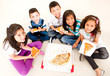 Group of kids eating pizza