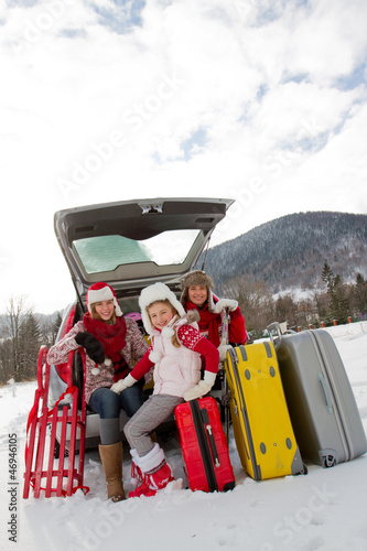 Photo: Winter, travel - family ready for the travel for winter holiday Winter, travel - family ready for the travel for winter holiday
