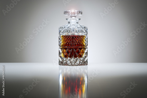 Photo: Crystal decanter with whiskey or brandy Crystal decanter with whiskey or brandy