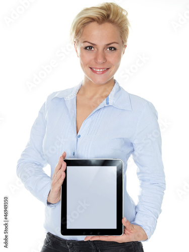Photo: Business woman showing her tablet pc with copyspace Business woman showing her tablet pc with copyspace