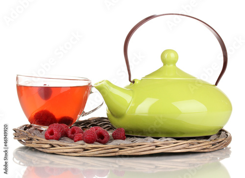 Photo: tea with raspberries isolated on white tea with raspberries isolated on white